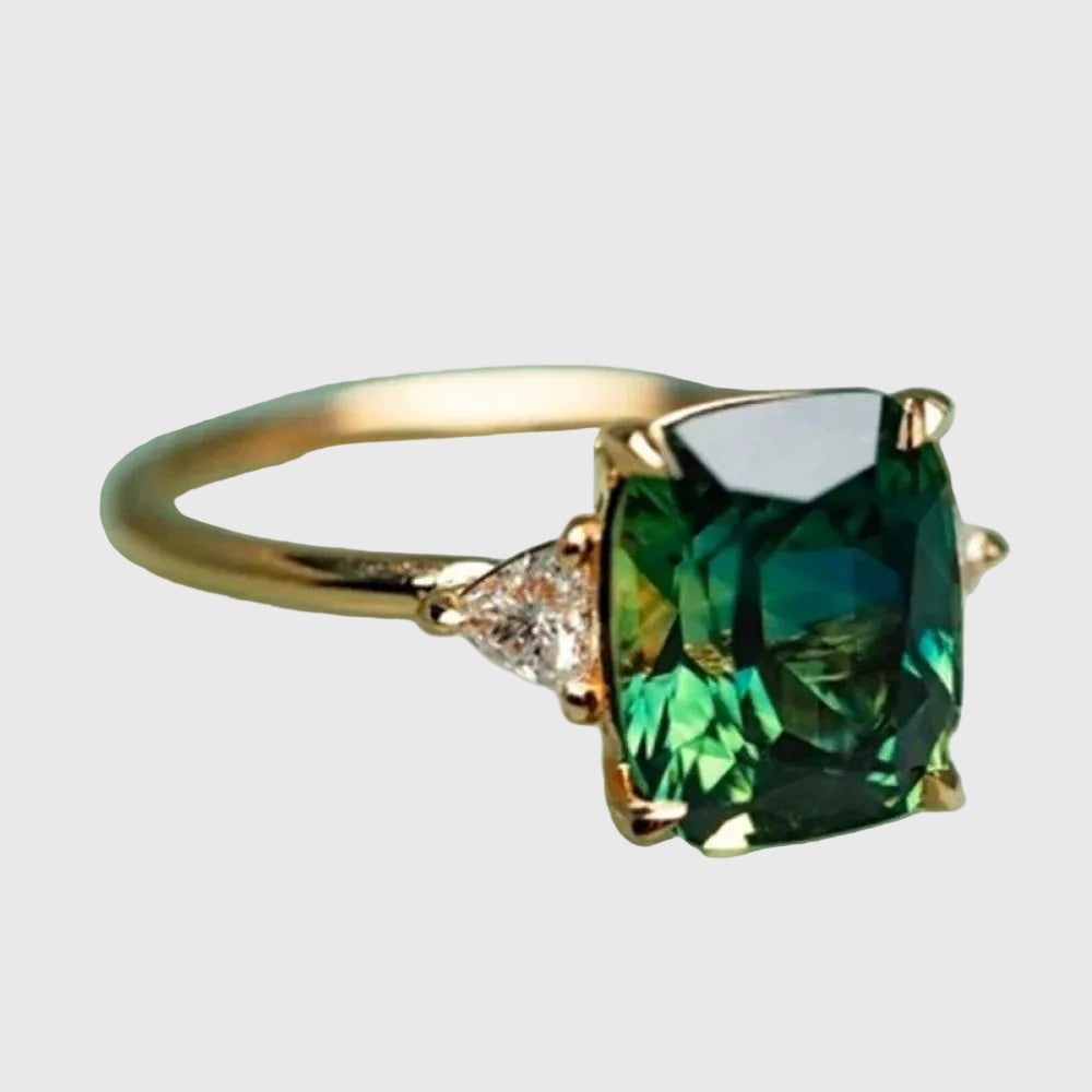Gold ring with green zirconia